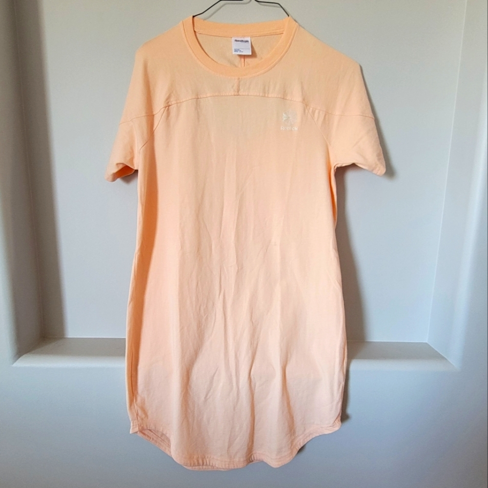 Peach Short Sleeve Reebok dress. M. NWOT